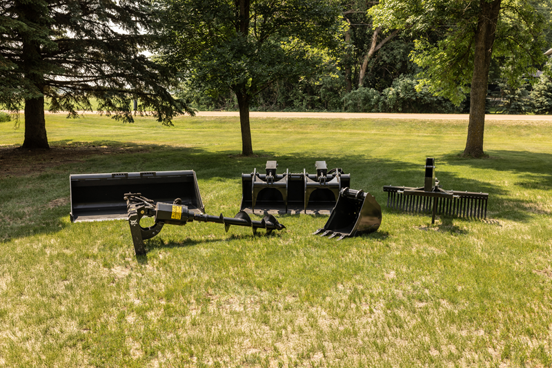 Bobcat attachment options in Lethbridge auger, bucket, scoop, grader