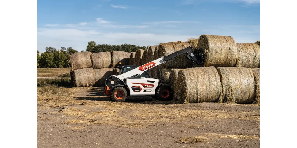 Bobcat TL519 working with bale forks - telehandler rental Lethbridge Alberta at Chinook Equipment